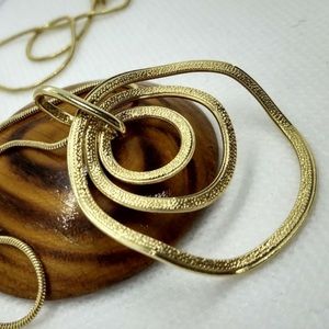 Melted Golden Target Necklace
